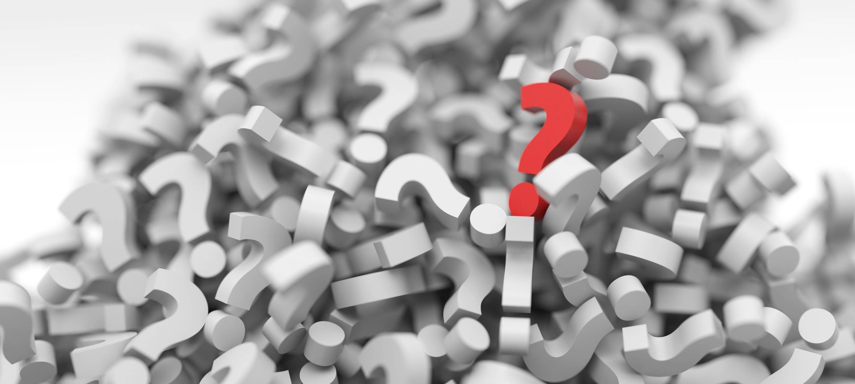 Fragezeichen rot in grauem Haufen